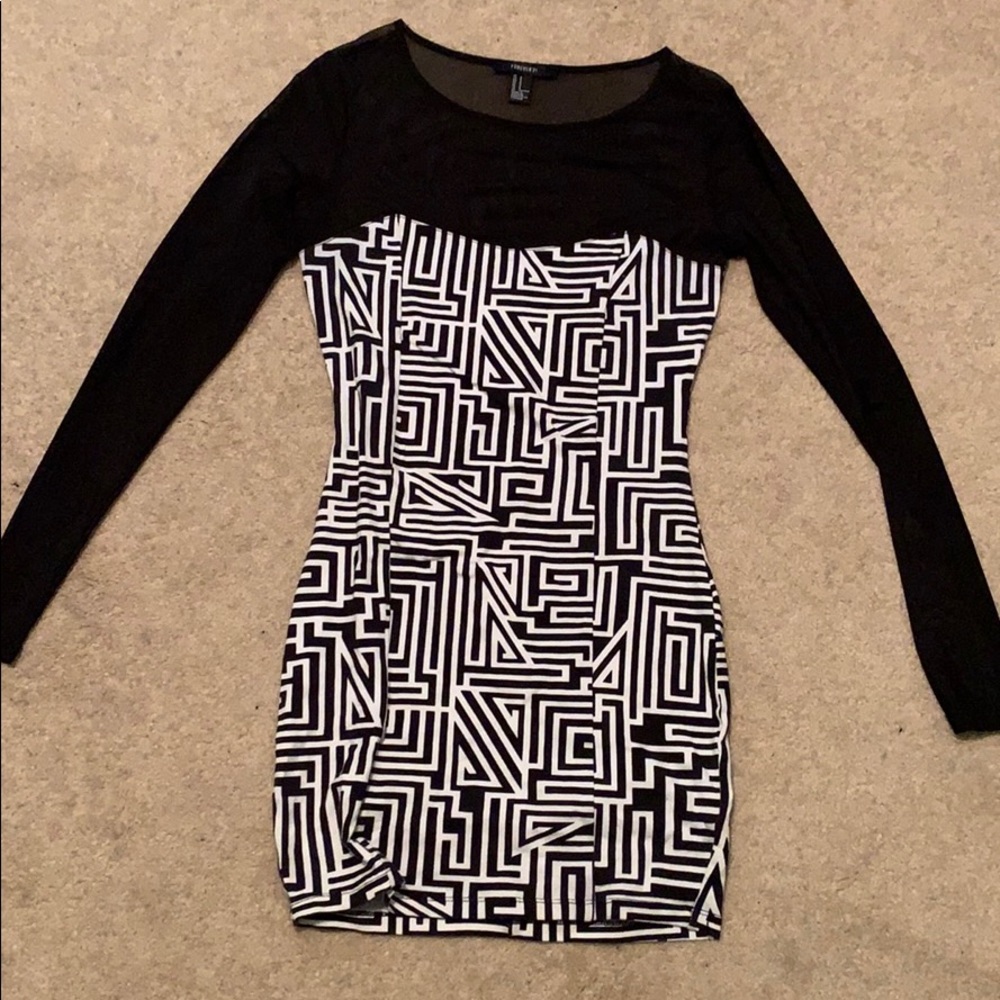 Tight dress with sheer sleeves